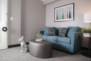 couch seating area in suite room