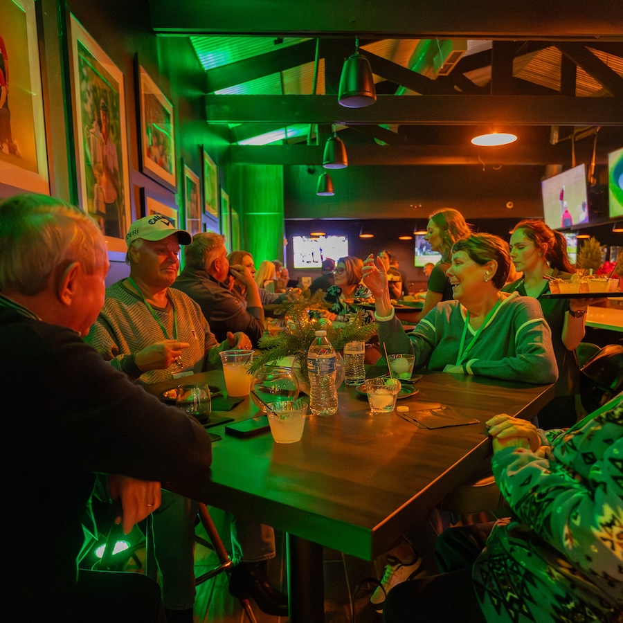 ParT Barn guests laughing and talking at a table