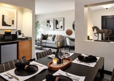 Ironwood Lodge Room with Set Table and Living Room Area